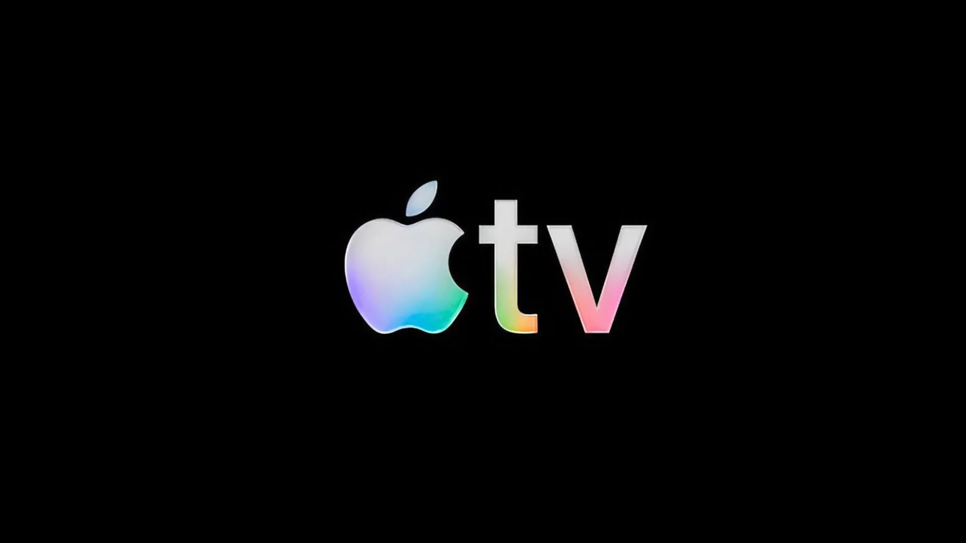 Siyah zemin üzerinde gökkuşağı renklerinde parlayan Apple TV logosu.