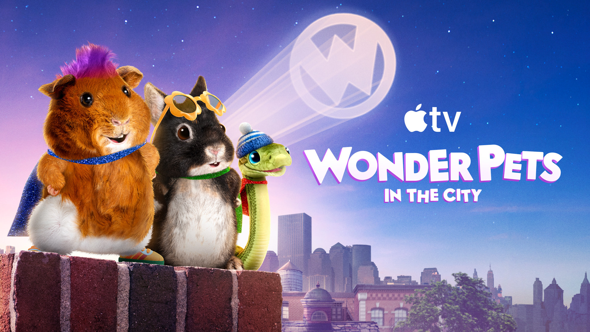 Wonder Pets: In the City tanıtımı: tuğla duvar üzerinde duran kobay, kaplumbağa ve ördek yavrusu kuklaları.